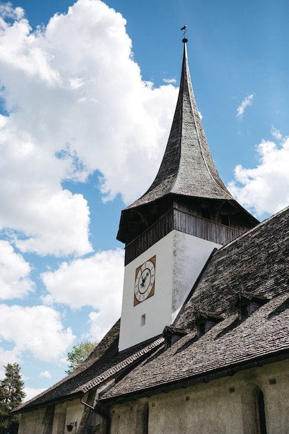 View on upper part of old time church in Switzerland