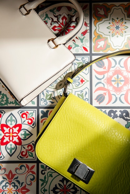 View of women's bag with mediterranean tiles aesthetics