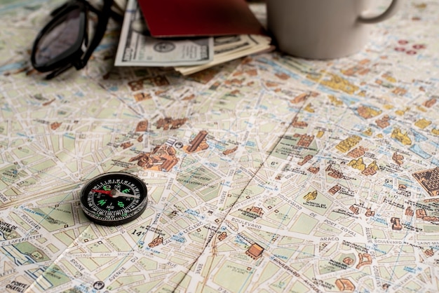 Free photo view of world travel map with compass