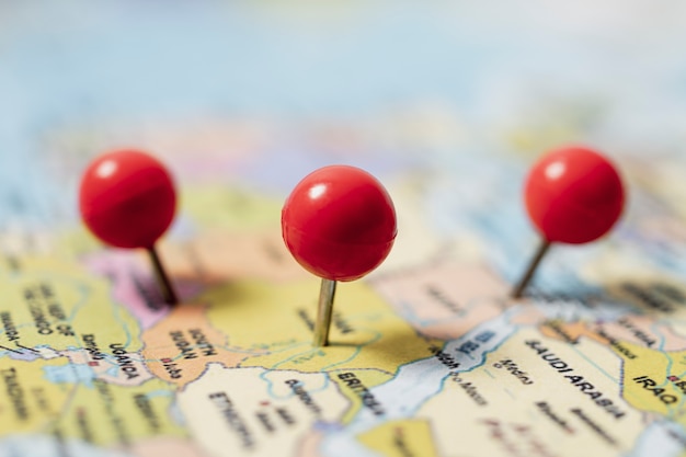 View of world travel map with pins