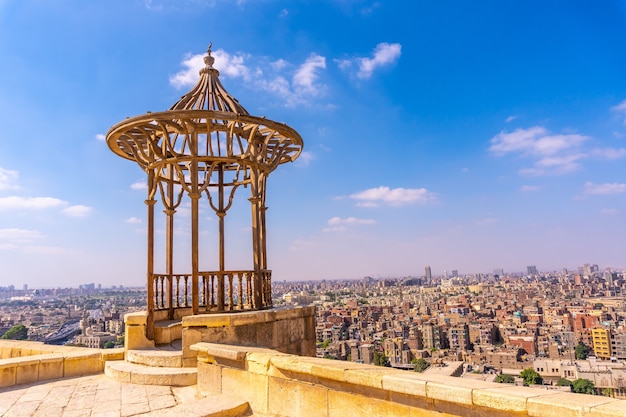 Viewpoint of the Alabaster Mosque under a blue sky in Cairo, Egypt
