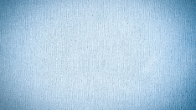 Vignette blue fabric textured background