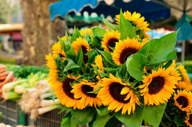 Village market with sunflowers