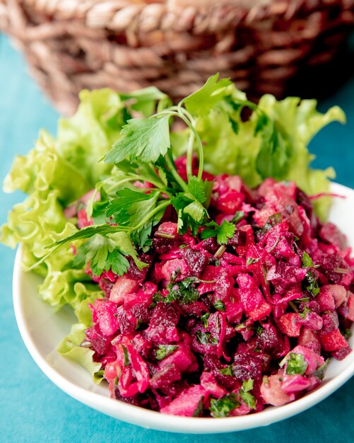 Vinegret salad served with lettuce and greens