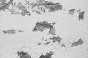 Бесплатное фото Винтажная черно-белая стена с царапинами