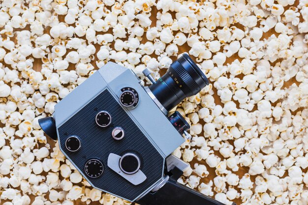 Vintage camera on top of popcorn