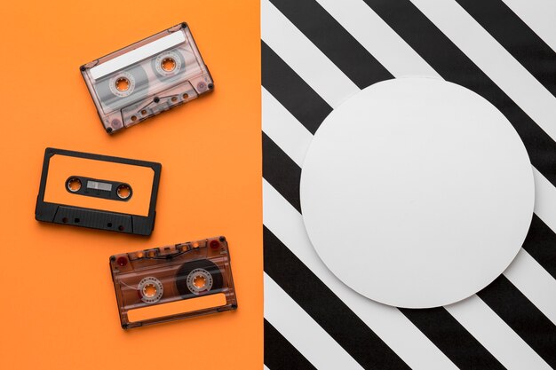 Free Photo Vibrant Cassette Tape On Bright Wallpaper