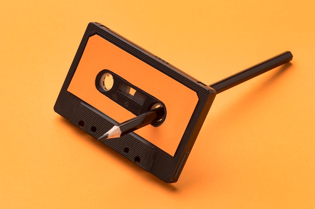 Vintage cassette tape with pencil for magnetic recording film