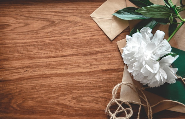 Vintage composition with envelopes on wooden background flat lay