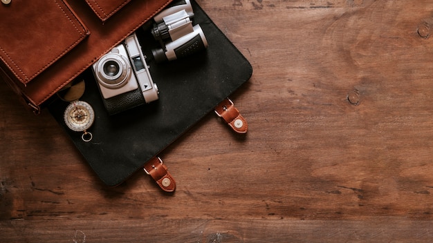 Free photo vintage desk concept with bag