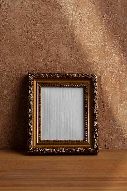 Vintage empty frame with stucco background