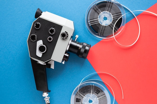 Free photo vintage film camera with movie reel