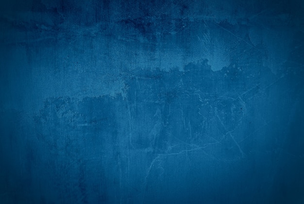 Vintage grunge blue concrete texture wall background with vignette.