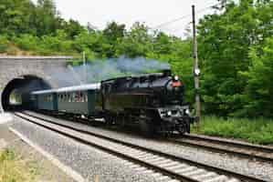 Free photo vintage locomotive on the railway