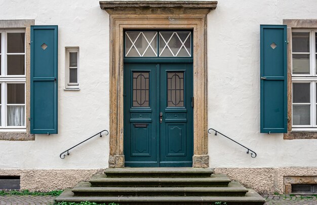 Vintage old doors and windows on the facade of the house