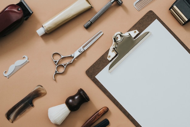 Free photo vintage paper clipboard salon tools in jobs and career concept