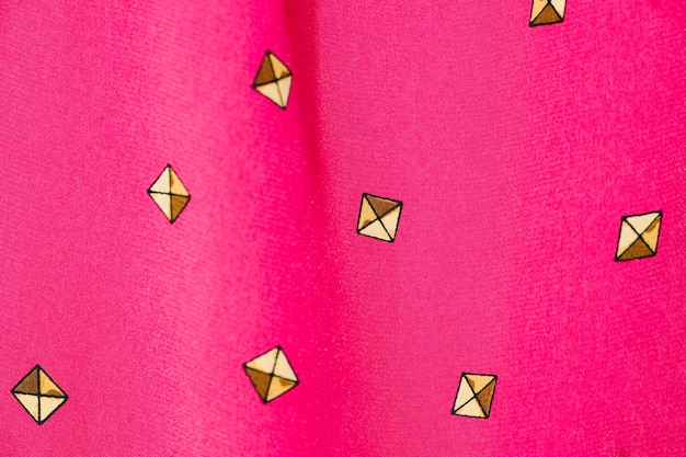 Free photo vintage pink fabric close-up