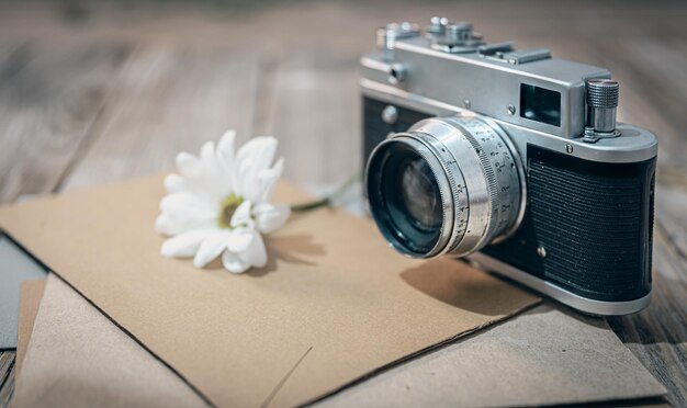 Vintage retro camera and envelopes with letters closeup