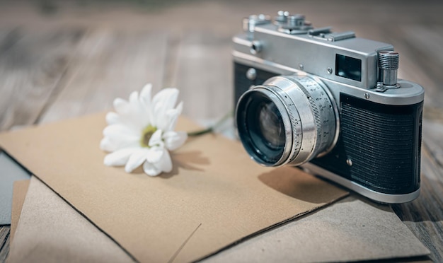 Vintage retro camera and envelopes with letters closeup