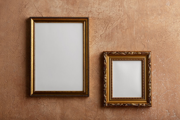 Vintage shiny frames on wall