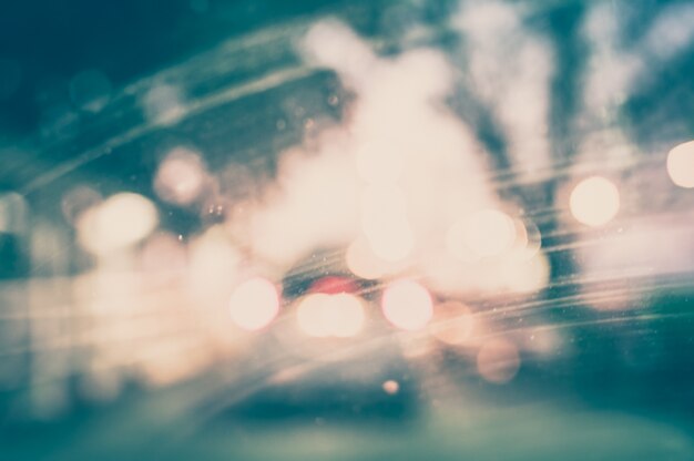 Vintage Style - blurred luxury car on road.