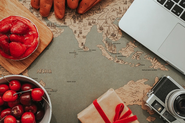 Free photo vintage world map background with father's day objects