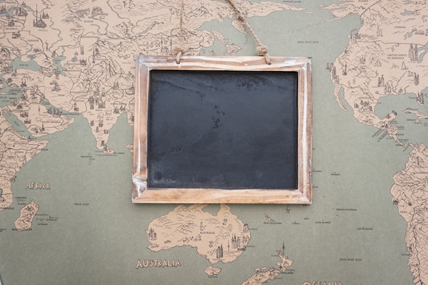 Vintage world map background with slate