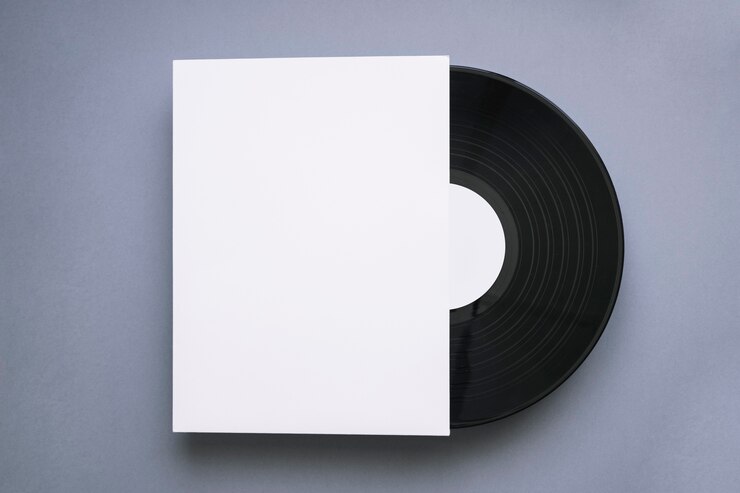 Free Photo vinyl mockup with paper