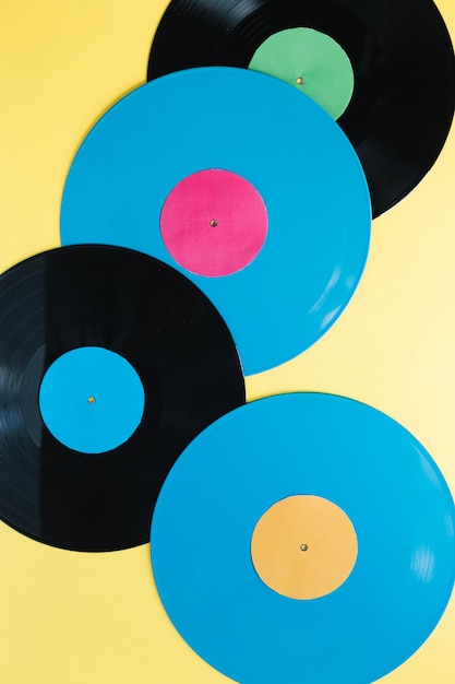 Free photo vinyl records on yellow