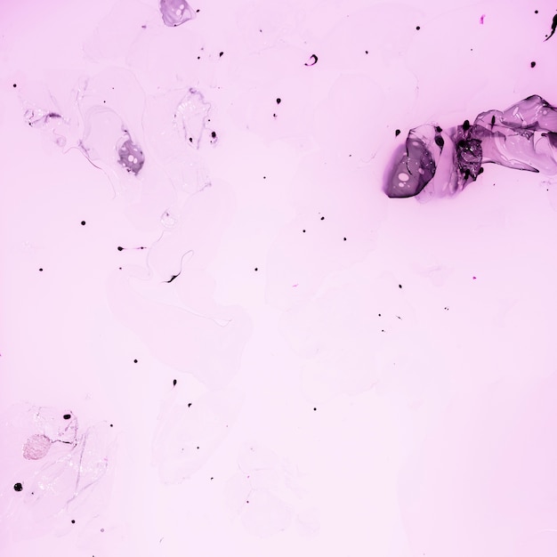 Violet background with ink drops