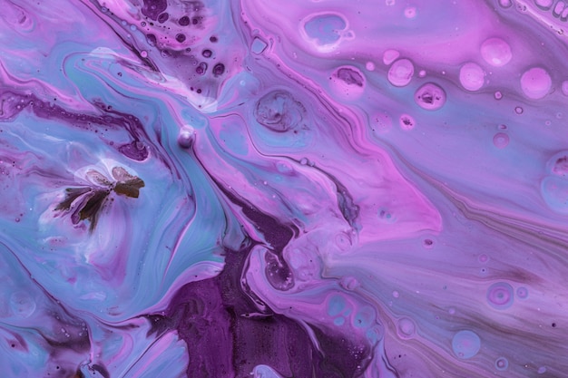 Free photo violet fluid acrylic pour painting