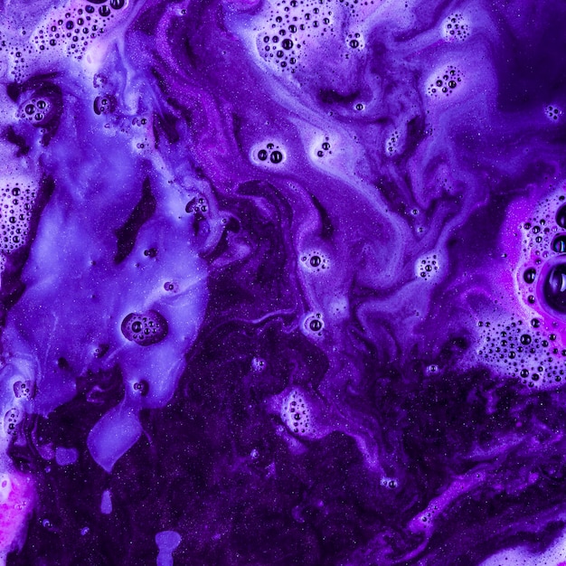 Violet liquid with light foam