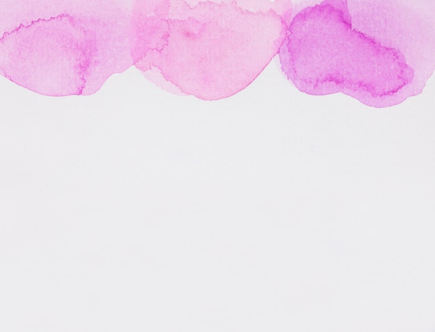 Violet paints on white paper