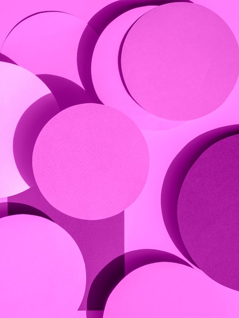 Free photo violet paper circles of geometric background