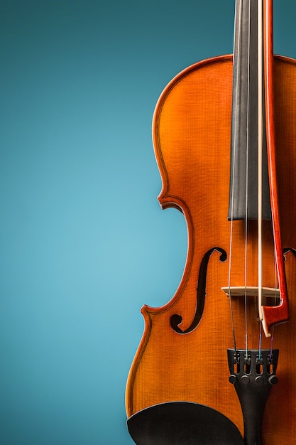 The violin front view on blue