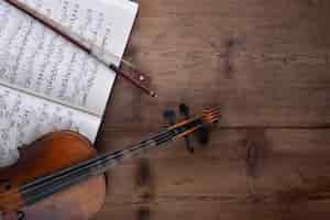 Free photo violin and score top view