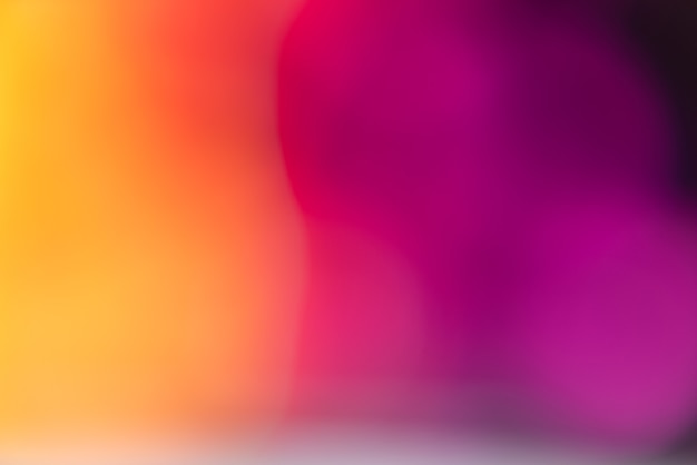 Free photo vivid blurred colorful wallpaper background