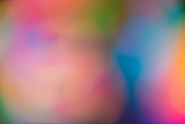 Free photo vivid blurred colorful wallpaper background