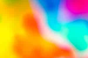 Free photo vivid blurred colorful wallpaper background