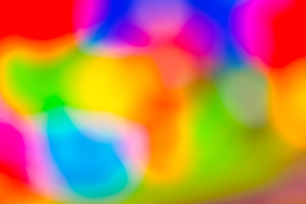 Free photo vivid blurred colorful wallpaper background