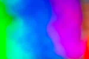 Free photo vivid blurred colorful wallpaper background