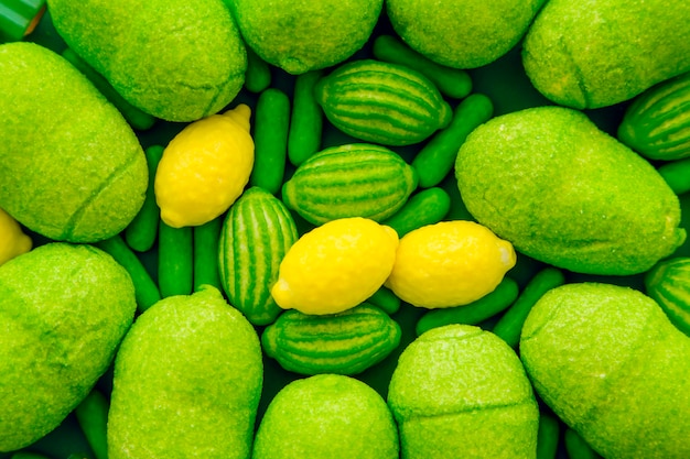 Free photo vivid green and yellow candies