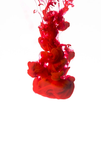 Vivid red droplet of ink