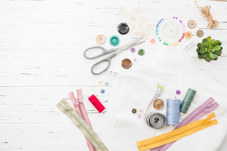 Free Photo vivid sewing items on wooden background