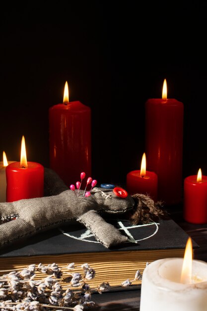 Vodoo doll and candles arrangement