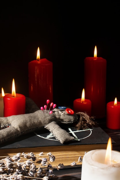 Vodoo doll and candles arrangement