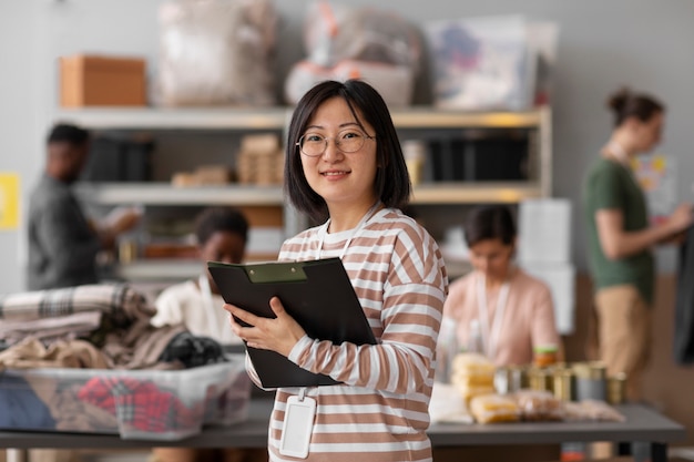 Free photo volunteer organizing donations for charity