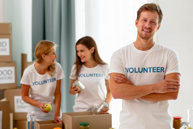 Volunteers at work preparing donations for charity