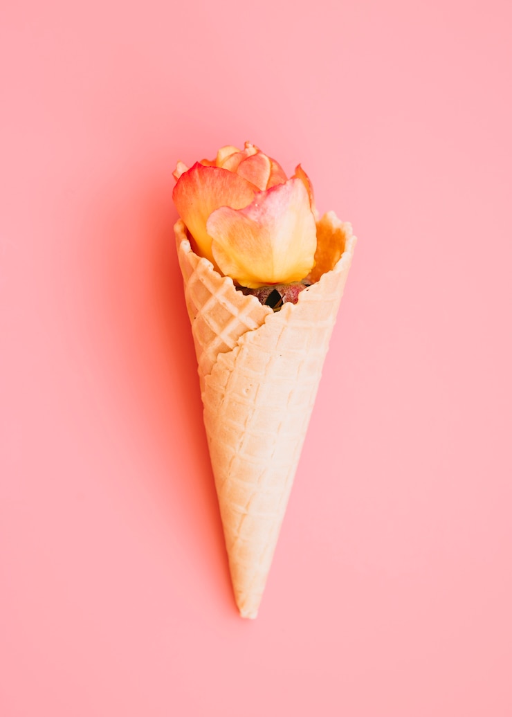 Free Photo wafer cup with orange bloom 