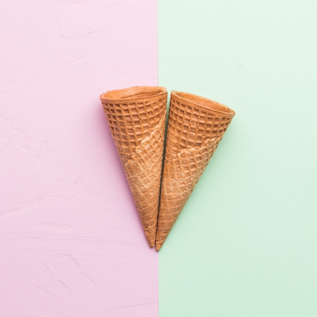 Waffle cones on different color background